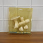 Top view of liquid soap dispenser featuring suction cup wall mount