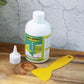 Hand applying waterproof wall filler cream to damaged wall surface