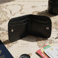 Multi-purpose wallet pouch featuring secure dual snap-button closure