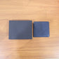 Slim leather-style bi-fold wallet for men showcasing clean professional design