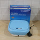 The Mini Portable Washing Machine gently washing delicate clothes, ensuring hygiene.