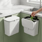 Kitchen dustbin on countertop with lid