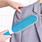 Close-up of the self-cleaning double-sided pet fur remover brush in action.