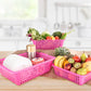 Set of three Plastic Cane Fruit Baskets in large, medium, and small sizes on a kitchen counter.