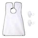 Man using a black beard apron with suction cups to catch hair clippings while shaving.