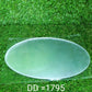 An oval mirror sticker shown in a home office setting, adding a reflective accent.