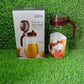 Ganesh 1000ml stainless steel oil dispenser on a kitchen counter.