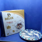 Detailed view of the durable plastic and silver-plated Rotating Dry Fruit Tray.