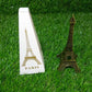 Antique finish Eiffel Tower metal statue from an elevated angle.