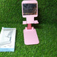 Lifestyle shot of the adjustable phone stand with mirror, holding a smartphone.