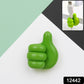 Close-up of flexible green hand-shaped clip holding a cable firmly
