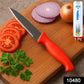 Sharp serrated kitchen knife slicing tomato easily