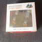 Dashboard mobile phone stand with hidden parking number plate display
