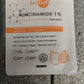 In’lief Niacinamide calming face mask displayed in a natural setting