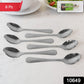 Stainless steel spoons neatly arranged on a white background, showcasing their polished finish