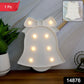 Illuminated pink LED Bell Shaped Night Light adding soft glow to room