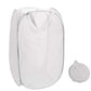 Organizing clothes with collapsible mesh laundry hamper