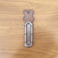 Self stick push pull helper shown firmly attached to cabinet surface
