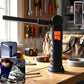 Focused beam from adjustable arm LED work light illuminating workspace