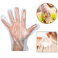 A hand wearing a transparent disposable clear glove, demonstrating its comfortable fit.