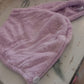 Lifestyle image of a woman comfortably wearing the VelvaBloom turban towel.