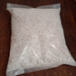 Lightweight Indo Glow Perlite used as a soil conditioner for plants.