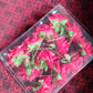 Packaging of the 12-piece red rose hair clip set, ideal for gifting.