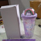 Detailed view of the hard acrylic sipper bottle with a secure lid and straw.