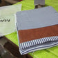 Stack of two stylish leather and cotton pillow covers for home decor