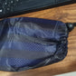 Empty washable rope pouch, ready to be filled with travel essentials.