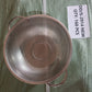Angled view of the elegant stainless steel strainer bowl, perfect for Indian kitchens.