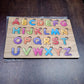 Complete wooden ABC letters and shapes puzzle, ready for playtime and learning.