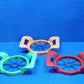 Side view of the multi-color Apple Cutter, showcasing its sturdy construction and ease of handling.