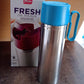 Kitchen oil dispenser bottle with easy grip handle and leak-proof flip lid