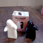 Styled image of modern ceramic salt and pepper shakers in couple hug