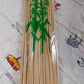 Colorful vegetables and chicken pieces prepared on bamboo shish kabob sticks.