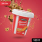 Jar of Caramelised Biscuit Spread from Chocotown, with a spoon scooping out a generous portion.