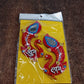 Detailed view of hand-painted wooden Shubh Labh wall hanging with stones and mirrors