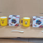 Stylish designer coffee mug with spoon and gift box, ideal for hot beverages.