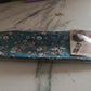 Detailed close-up of the Knotted Wire Headband's fabric texture and knot design.