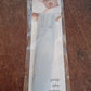 Silicone pastry brush ready for use in a modern kitchen setting.