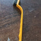 Ergonomic handle of the mini nylon cleaning brush for comfortable grip.