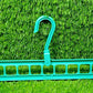 Single multi-functional clothes hanger demonstrating its vertical hanging option.