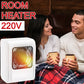 Person enjoying warmth from the VoltDesk room heater in a living room.