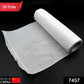 Close-up of a non-woven, oil-absorbing kitchen tissue sheet showing its texture.