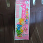 Packaging box for giraffe ruler set showing product branding and design