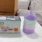 Vibrant purple baby food container with 3 layers, showcasing its practical design.