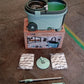 All components of the Ganesh Quick Spin Mop, including the bucket, handle, and two mop heads.
