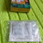 Display of Kinoki Detox Foot Pads with key natural ingredients like ginger and salt.