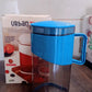 Compact plastic water jug fitting fridge door compartments